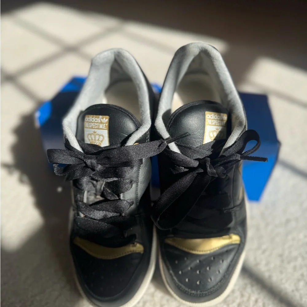 Adidas Sneakers in Black and Gold